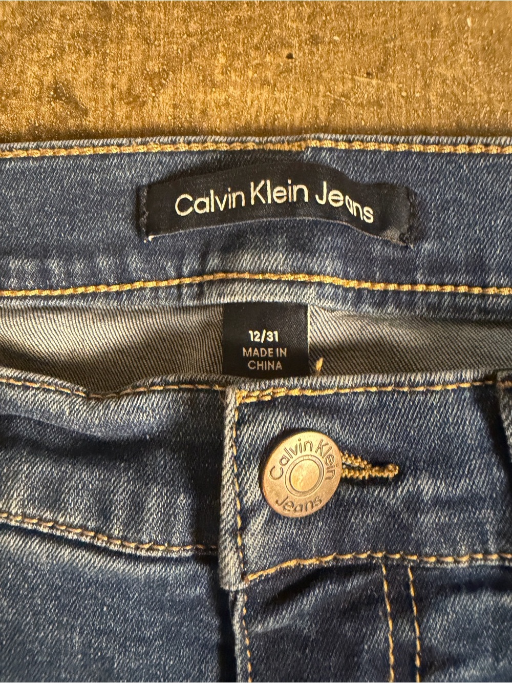 Calvin Klein Jeans High-Rise Cropped Dark Blue Denim Jeans with Raw Hem